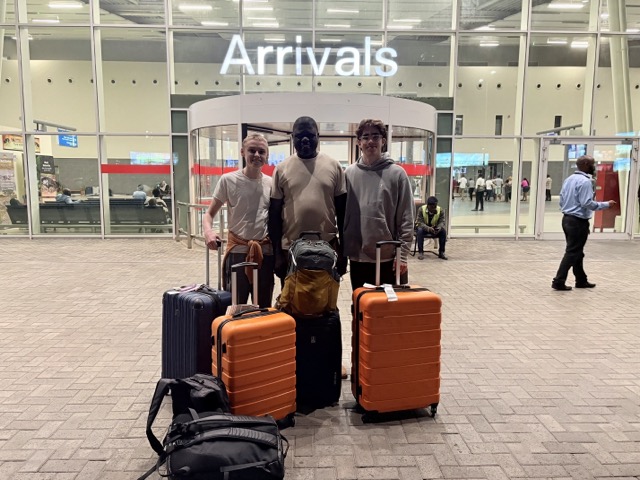 George, Ryder, and I in front of Julius Nyerere National Airport